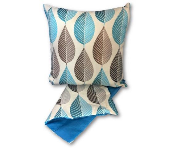 Cushion cover featuring geometric leaves in soothing blue tones, perfect for modern home decor and easy to wash.