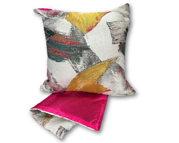 Elegant pink brush stroke cushion cover, 44cm x 44cm, crafted from durable fabric with easy zip for cleaning.