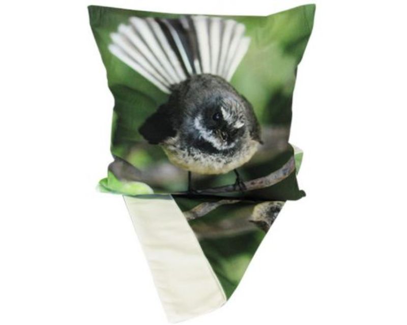 Cushion cover featuring a detailed Piwakawaka Fantail design, perfect for adding nature-inspired charm to any decor.