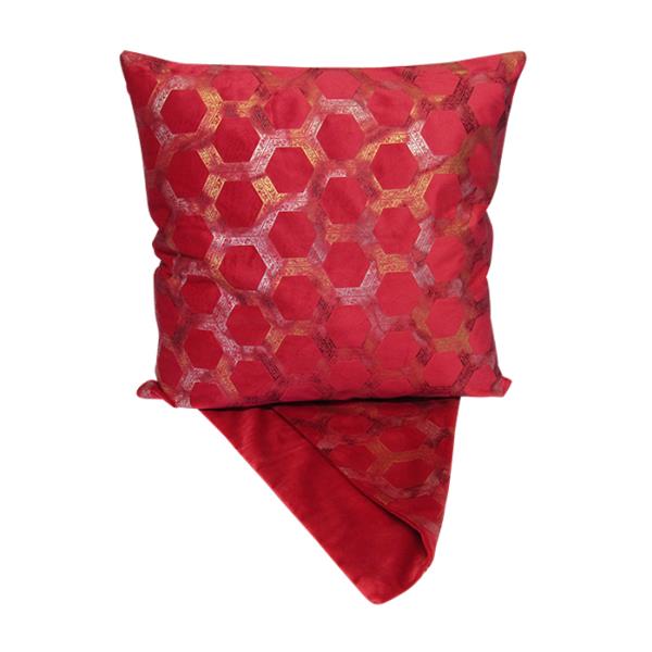 Cushion cover featuring a striking honeycomb pattern in vibrant red, perfect for adding color and style to any room.