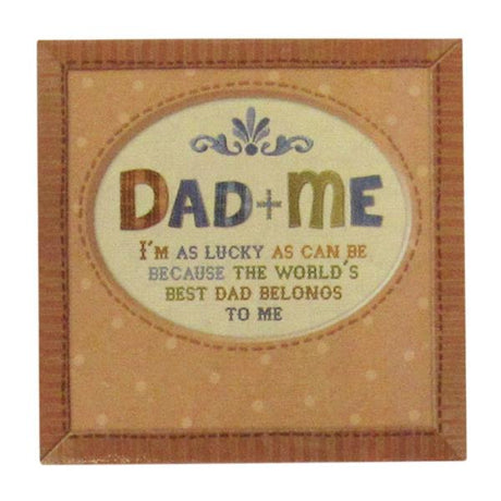 Ceramic message tile "Dad and Me" celebrating father-child bond, includes shelf stand for display.