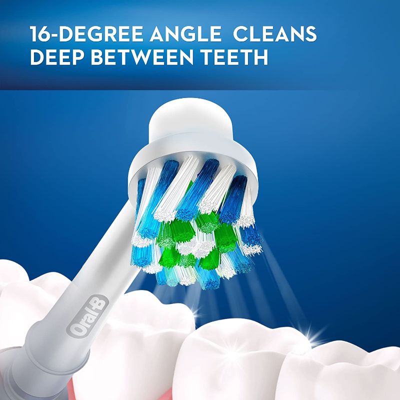 Three Oral-B CROSS ACTION replacement toothbrush heads with angled bristles for superior plaque removal and deep cleaning.