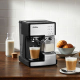 Sunbeam Café Barista coffee machine in black, featuring 15 bar pump, milk reservoir, and one-touch controls for espresso and frothy drinks.