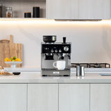 Silver and black Sunbeam Origins Espresso Machine with a 58mm group head, dual thermoblock heating, and integrated grinder.