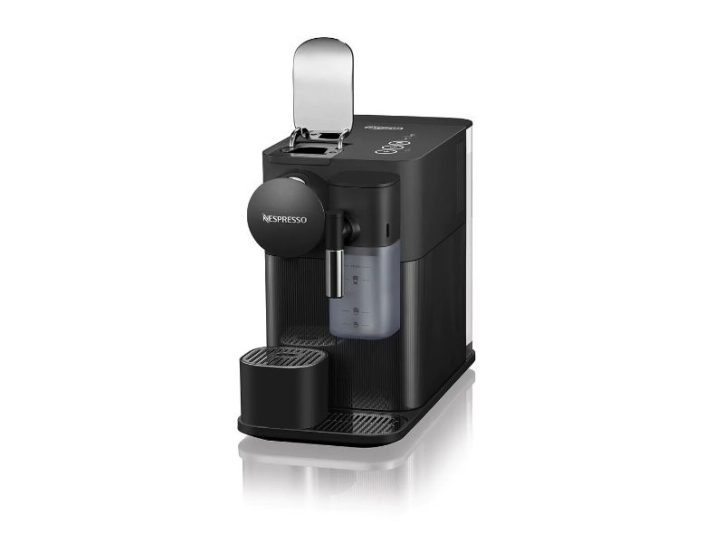 Sleek black single-serve coffee machine with patented milk system for barista-quality drinks and quick 25-second heat-up time.