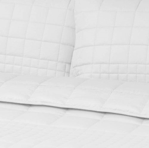 Elegant white quilted coverlet set for queen beds, includes 2 matching pillowcases, made from 100% cotton for year-round comfort.