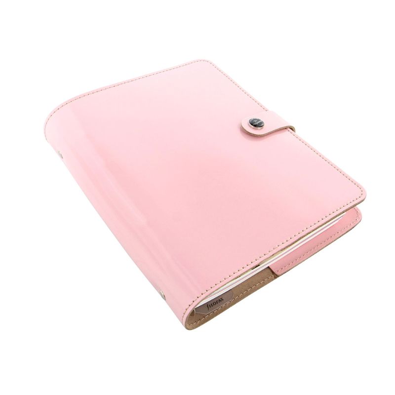 A5 leather planner in rose color, showcasing classic design and customizable inserts for elegant organization.