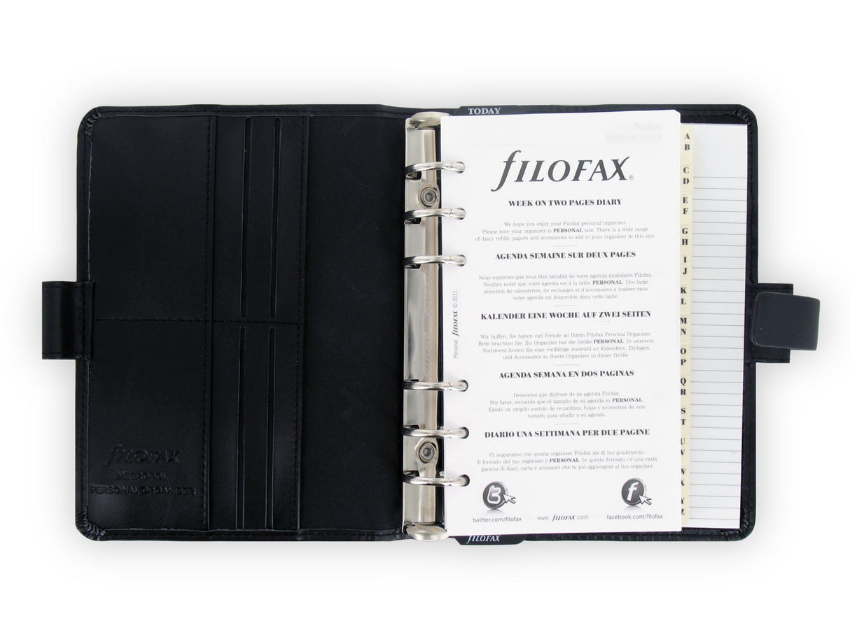 Filofax Metropol Personal Black organizer, sleek faux-leather with ample storage for notes, cards, and pens, perfect for daily tasks.