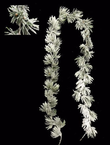 Artificial 1.8m Atlas Cedar Garland with faux snow, perfect for festive home decor on mantels, stairs, or doorways.