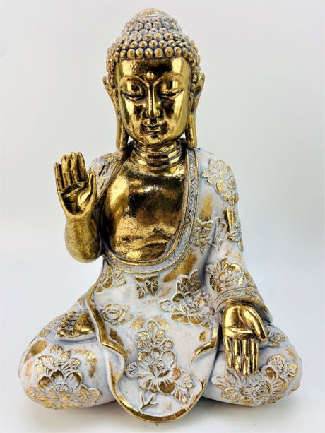 Gold Meditating Buddha Statue (19.5cm) adds tranquility and elegance to your space with intricate details and a luminous finish.