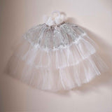 White and silver sparkle cape for children, ideal for dress-up, parties, and imaginative play; lightweight and stylish.