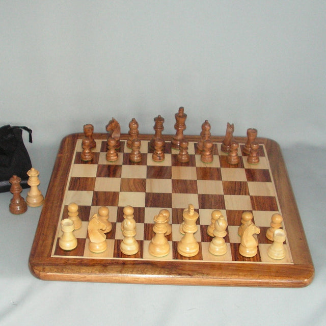 Hand-carved 16" chess set featuring a 75MM king, showcasing exquisite craftsmanship and elegant design for enthusiasts and collectors.