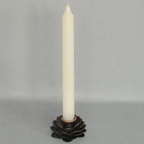 Elegant rose-patterned tealight holder, 7 x 7 x 4cm, perfect for creating a calming ambiance in any room.