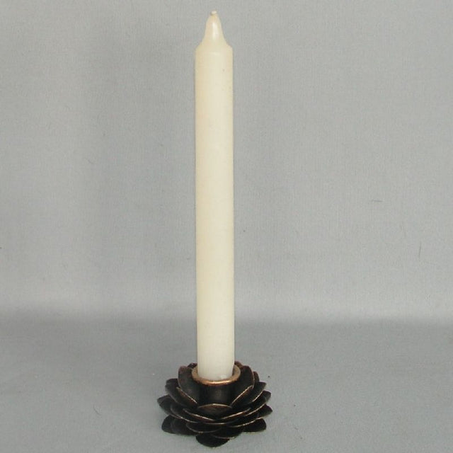 Elegant rose-patterned tealight holder, 7 x 7 x 4cm, perfect for creating a calming ambiance in any room.