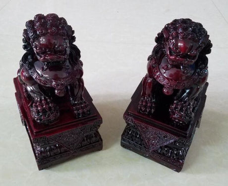 Intricately crafted 24cm Feng Shui Lion statues, symbolizing strength and protection, perfect for home or office decor.