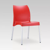 Vita Chair in red with polypropylene seat, anodized aluminum legs, perfect for indoor and outdoor use, space-saving design.