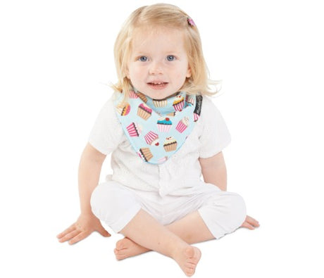 Reversible teal bandana bib featuring colorful cupcake prints, with three absorbent and waterproof layers for toddlers.