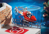 Colorful Playmobil Fire Station playset with fire truck, realistic equipment, and accessories for imaginative rescue adventures.