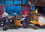 Playmobil Fire Station playset featuring a detailed firehouse, truck, equipment, and accessories for imaginative firefighting adventures.