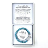 Turquoise crystal bracelet with heart charm and guardian angel, symbolizing love, protection, and tranquility.