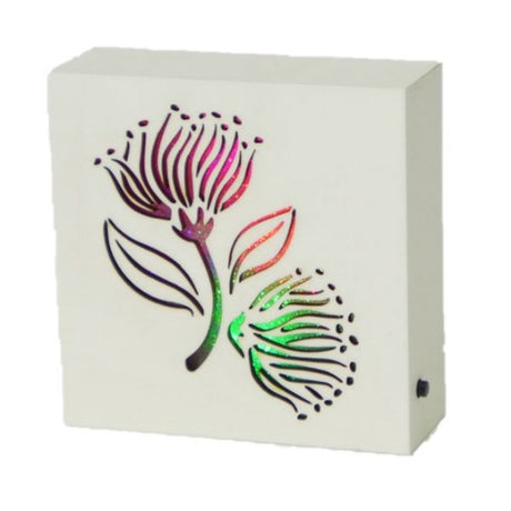 Pohutukawa Cream LED Block, 12x12x3.9 cm, emits a warm glow, showcasing coastal beauty and Christmas tree inspiration.