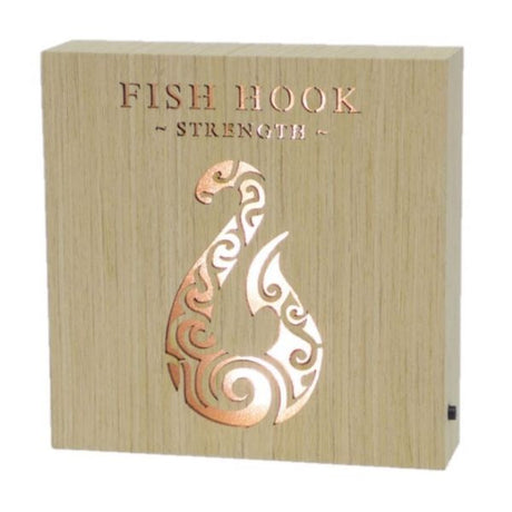 Kiwiana Fish Hook Strength Wooden Block, a handcrafted LED decor piece symbolizing Maori heritage and safe travels.