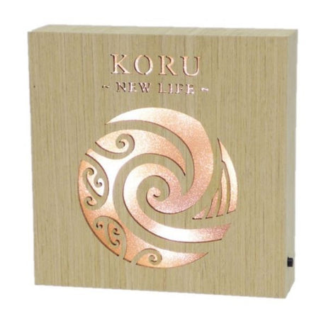 Kiwiana Koru Wooden LED Block, showcasing M?ori culture with a spiral design, perfect for home decor and ambient lighting.