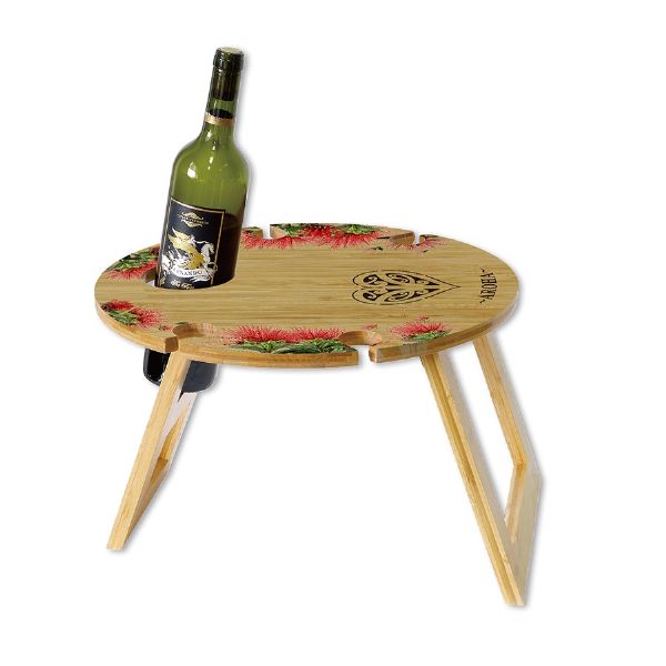 Eco-friendly Aroha Bamboo Round Table for outdoor wine enjoyment, holds one bottle and four glasses, lightweight and portable.