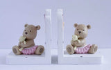 Charming Bear Girl Bookend Pair adds whimsy and functionality to bookshelves, perfect for kids' rooms or as a unique gift.
