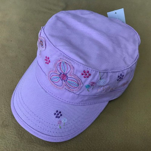 Adorable patchwork butterfly cap for infants, featuring colorful designs, soft fabric, and snug fit for sun protection.