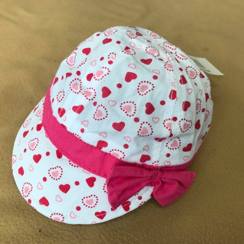 Pink Hearts Soft Cap for toddlers aged 1-3, featuring a soft fabric and charming heart pattern, perfect for sunny outings.