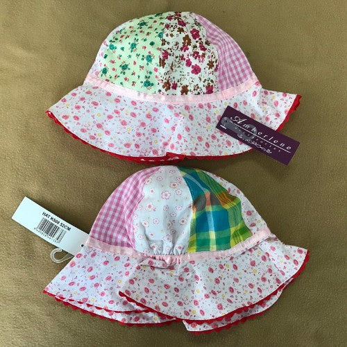 Colorful patchwork bucket hat for toddlers 1-3 years, featuring adjustable chin strap and soft, breathable fabric.