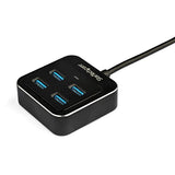 4-Port USB-C hub in black, features 4 USB-A ports, 10 Gbps data transfer, compact design for seamless connectivity.