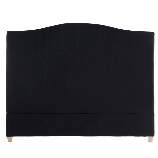 Luxurious black king headboard with tufted design, oak legs, and copper nail heads, enhancing any bedroom decor.