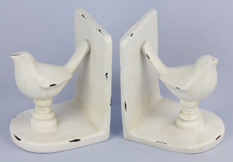 White bird bookends made of polyresin, measuring 25x10.5x15.8 cm, perfect for stylishly organizing books.