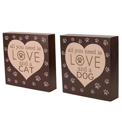 Canvas block set featuring dog and cat prints with heartwarming messages in sturdy wooden frames, perfect for home decor.