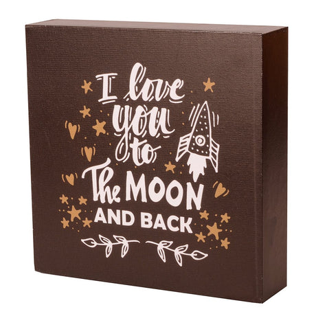 Canvas block featuring "Love You to the Moon and Back" message, ideal for shelves or walls, perfect for expressing affection.