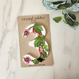 Decorative NZ Floral house number sign in white acrylic, 12cm tall, ideal for enhancing home entrance appeal.