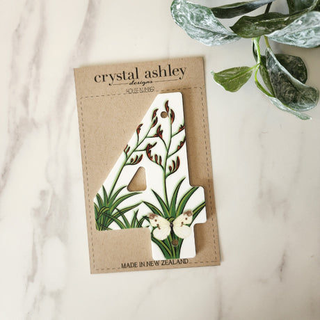 "Stylish NZ Floral 4 house number in 12cm white acrylic, perfect for adding curb appeal and easy to install."