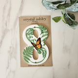 NZ Floral House Number '8', 12cm tall white acrylic, beautifully designed for easy visibility and elegant curb appeal.