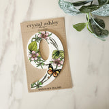 Vibrant NZ Floral 9 house number made from durable white acrylic, 12cm tall, perfect for stylish home address display.