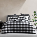 Elegant Super King duvet cover set in Hogan Slate with textured squares, durable jacquard front, and soft cotton blend reverse.