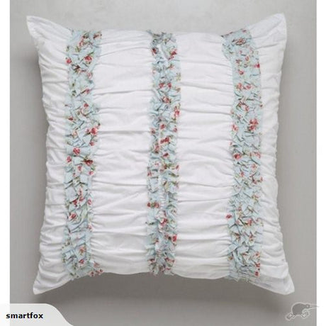 Elegant mint green cushion cover with holly patterns, perfect for style and comfort in any living space. 65x65 cm size.