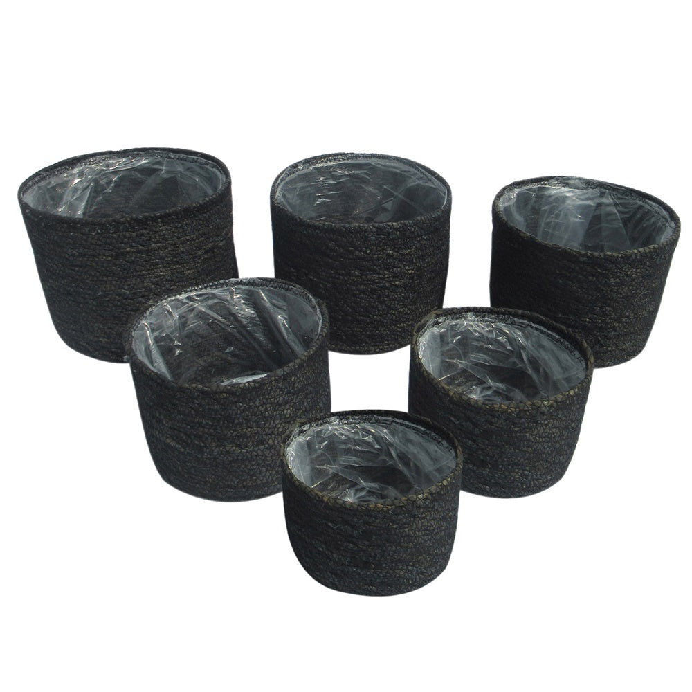 Set of 6 round charcoal seagrass baskets, lined for storage or planting, adding elegance and texture to any space.