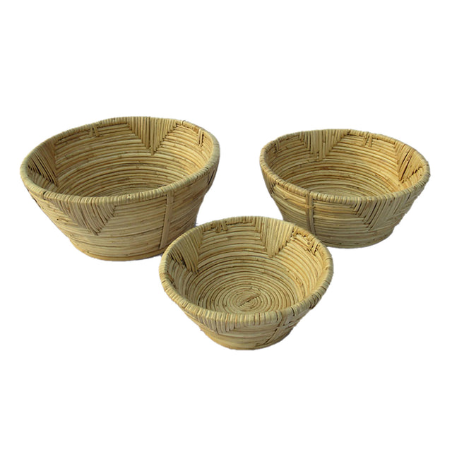 Handcrafted set of 3 rattan bowls, showcasing natural tones and textures, perfect for serving and decorating.