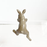 Charming natural finish rabbit ornament, perfect for hanging decor in any room or garden, 6 x 4.5 x 9.5 cm.