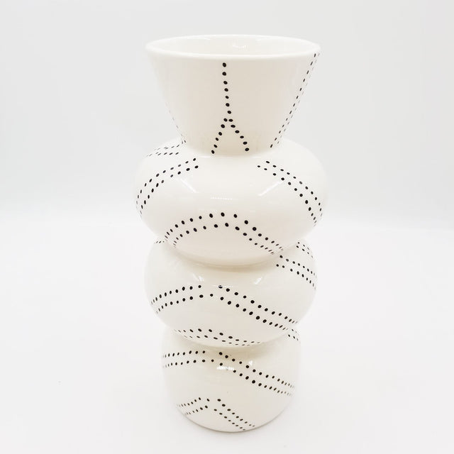 Elegant dolomite vase measuring 12x12x25cm, perfect for modern decor and displaying flowers or greenery.