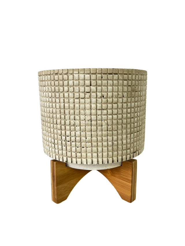 Cream checkered medium planter with stand, handcrafted with wooden legs, perfect for showcasing plants stylishly.