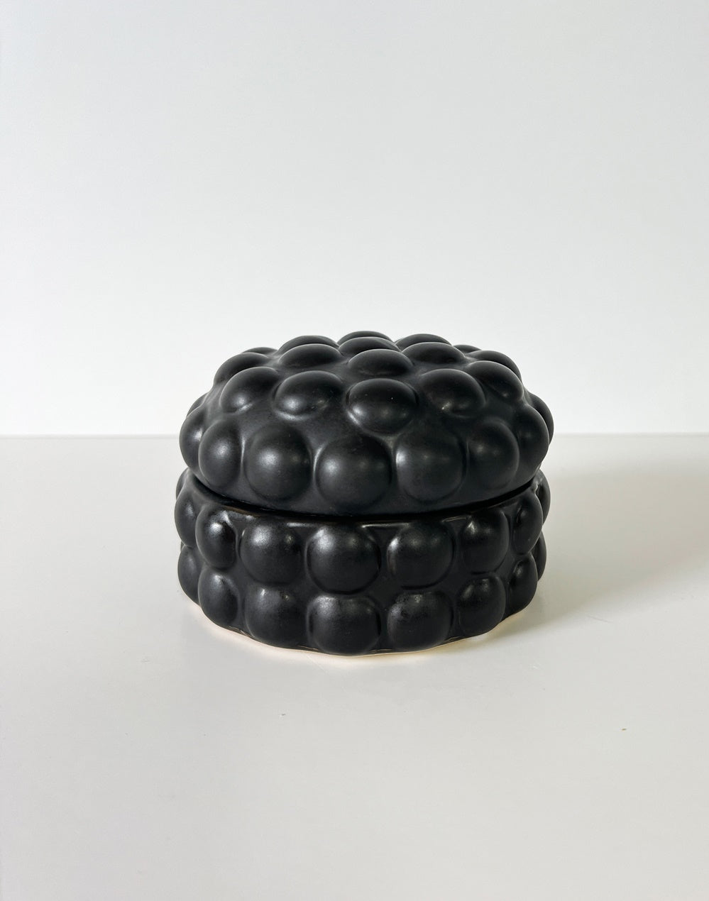 Set of 3 handcrafted black trinket boxes with a unique matte and glossy design, perfect for elegant home organization.