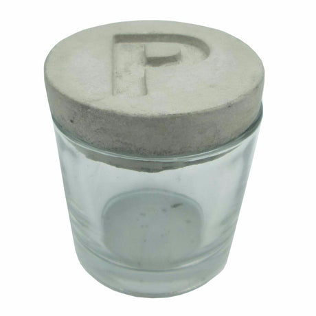 Stylish glass pinch pot with concrete lid, perfect for storing spices and enhancing kitchen decor. Measures 65 x 65 x 72mm.